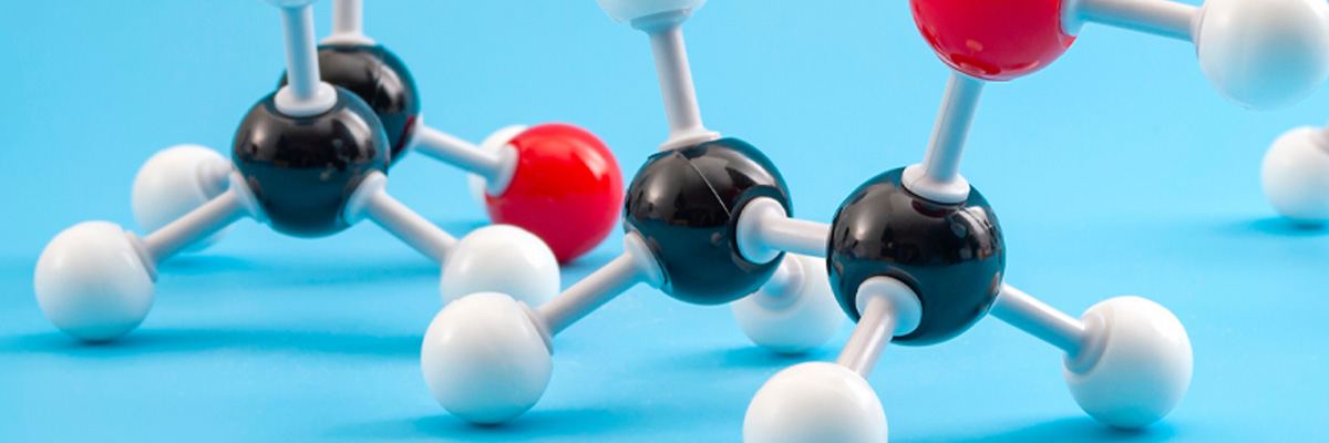 A molecular ball-and-stick model on a blue background