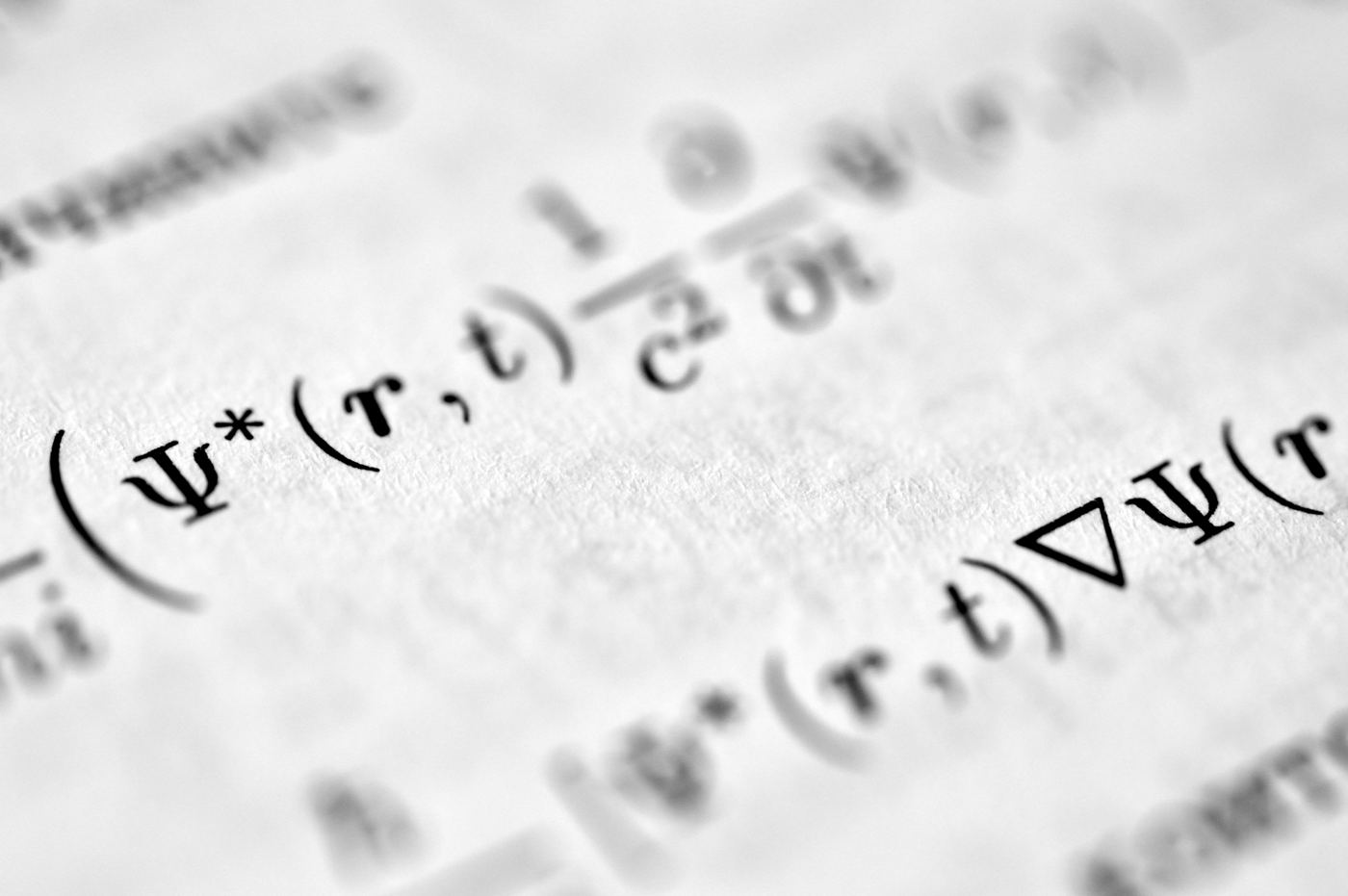 Close-up of a printed quantum mechanics wavefunction equation